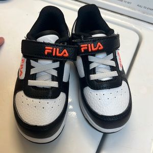 Fila tennis shoes. Toddler size 8. Good used condition. Smoke free home.